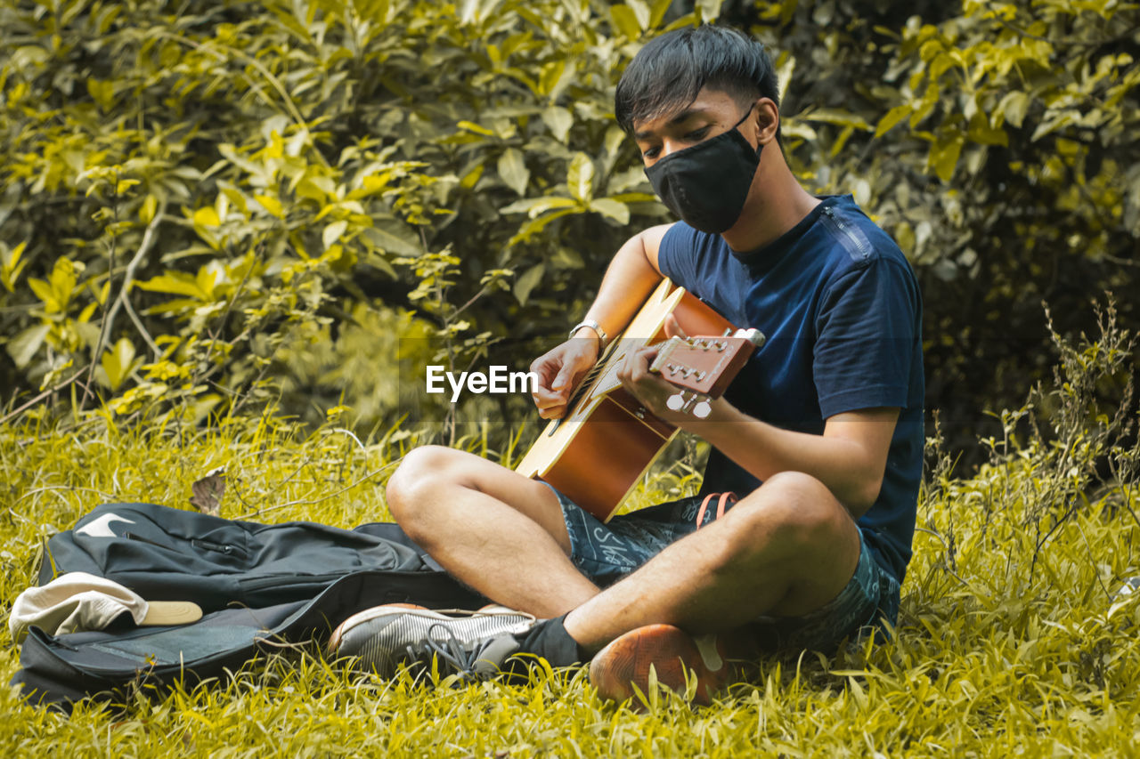 Young man with guitar