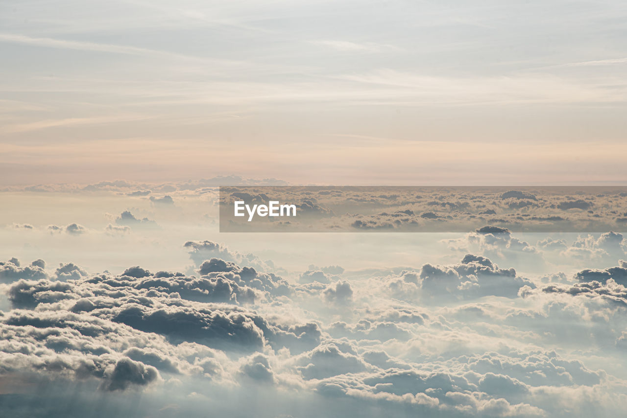 Aerial view of cloudscape against sky during sunset