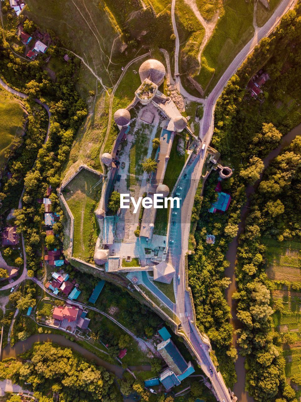 Aerial view of houses and trees in town