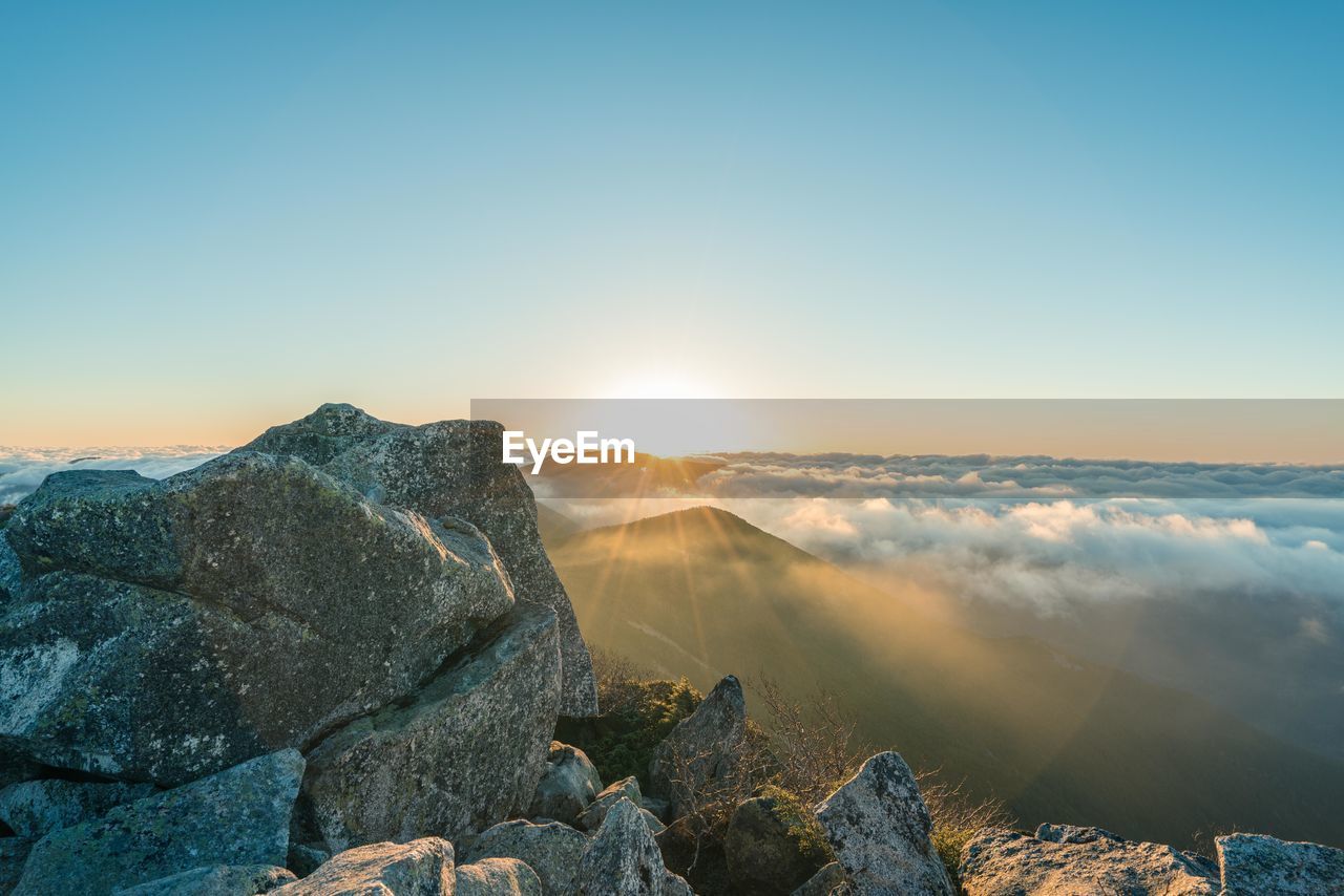 Scenic view of mountains against clear sky