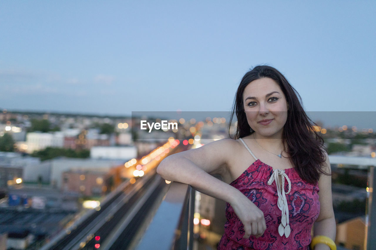 Young woman on a rooftop