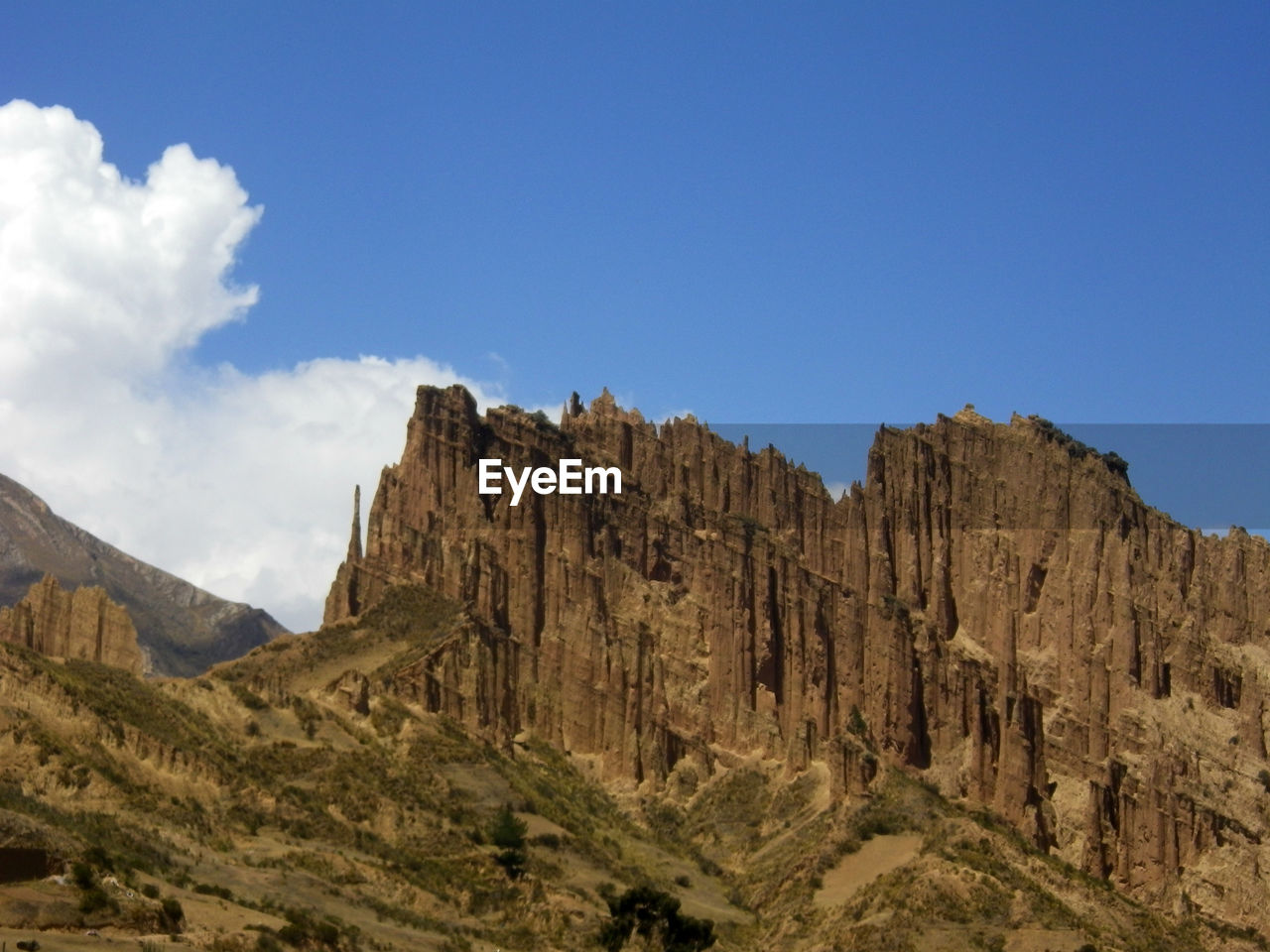 Scenic view of rocky mountains against sky