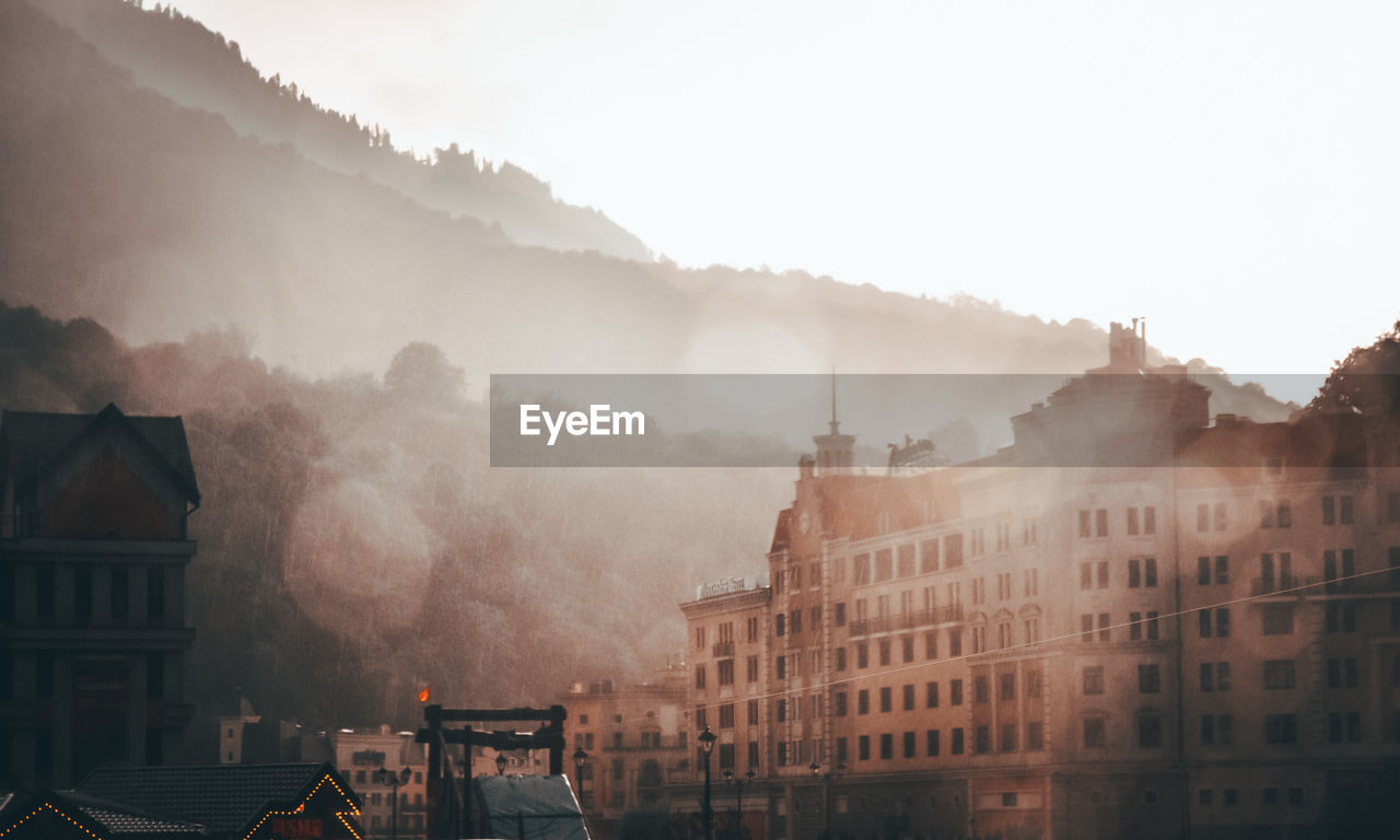 PANORAMIC VIEW OF BUILDINGS AGAINST SKY