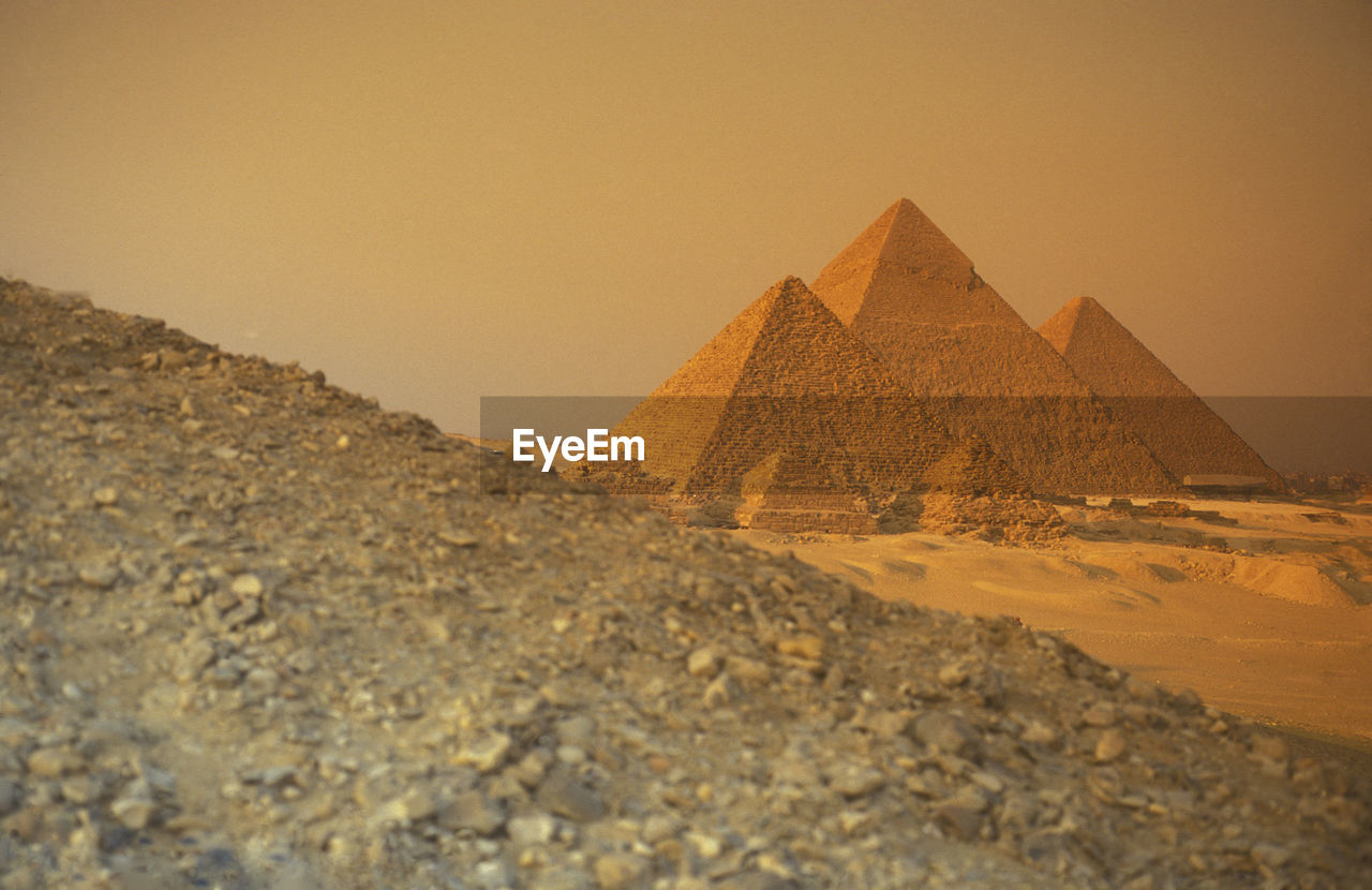 Ancient pyramids against clear sky