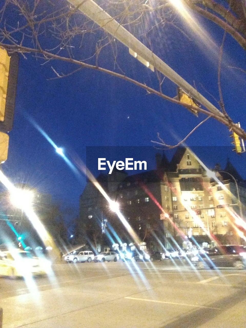 VIEW OF ILLUMINATED BUILDINGS AT NIGHT