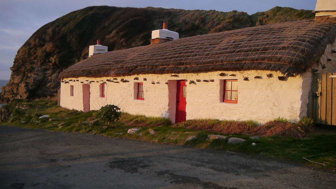 HOUSES IN VILLAGE AGAINST SKY