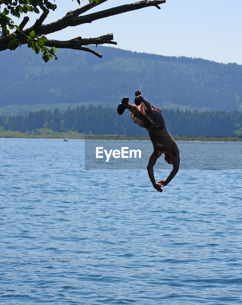 Man diving in to lake