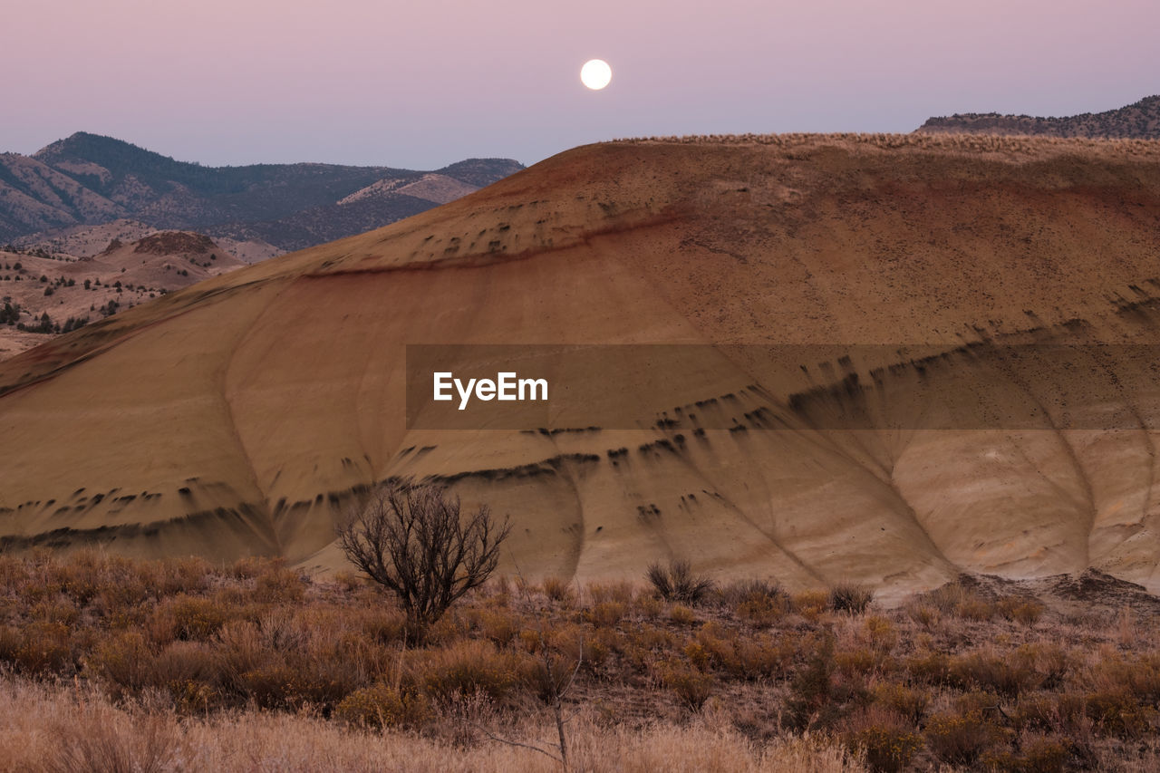 Scenic view of desert against sky