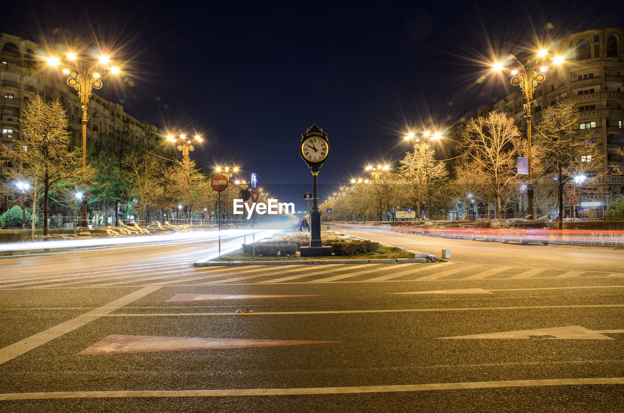 Light trails over street at night