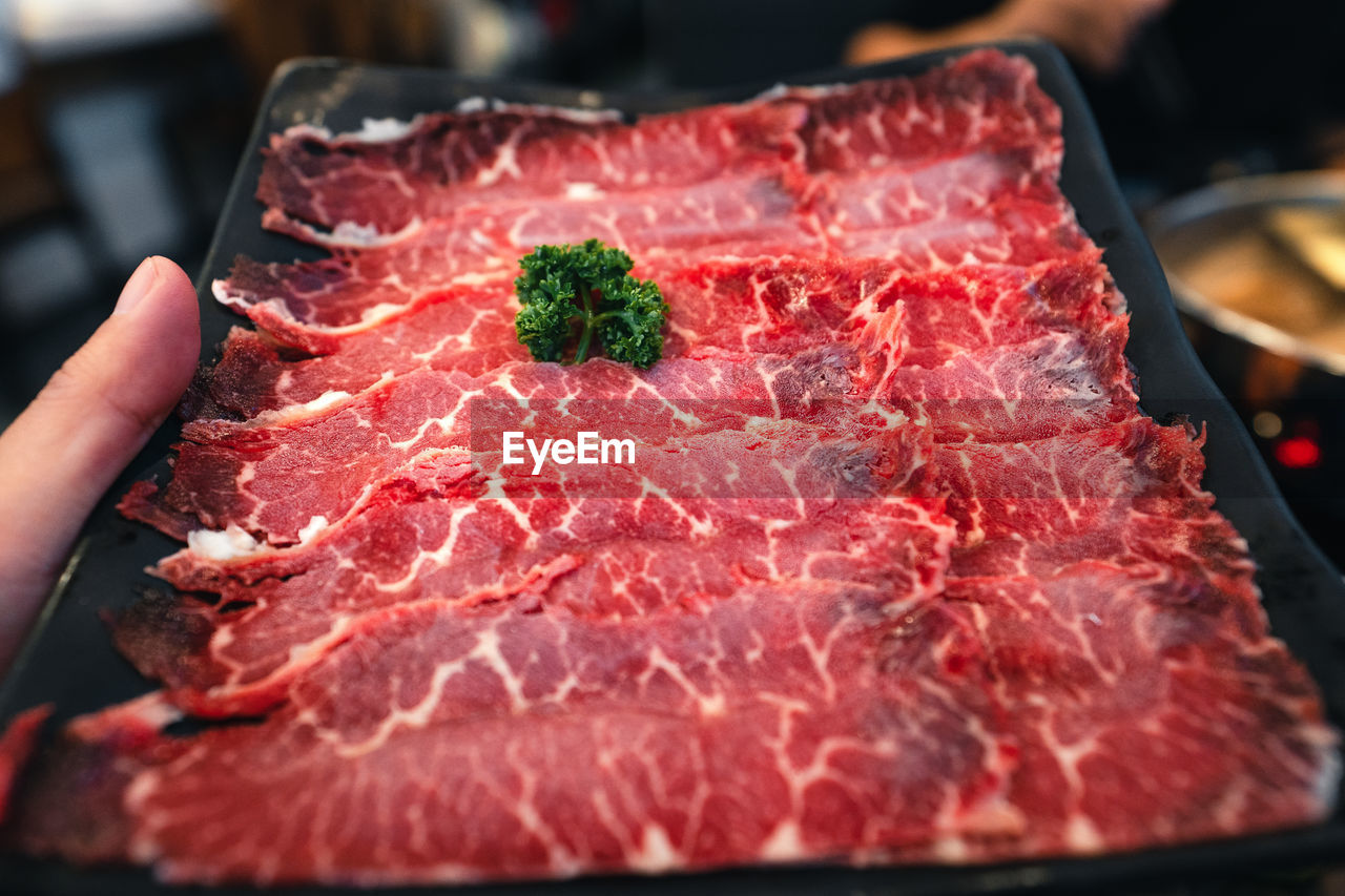 High angle view of person preparing food