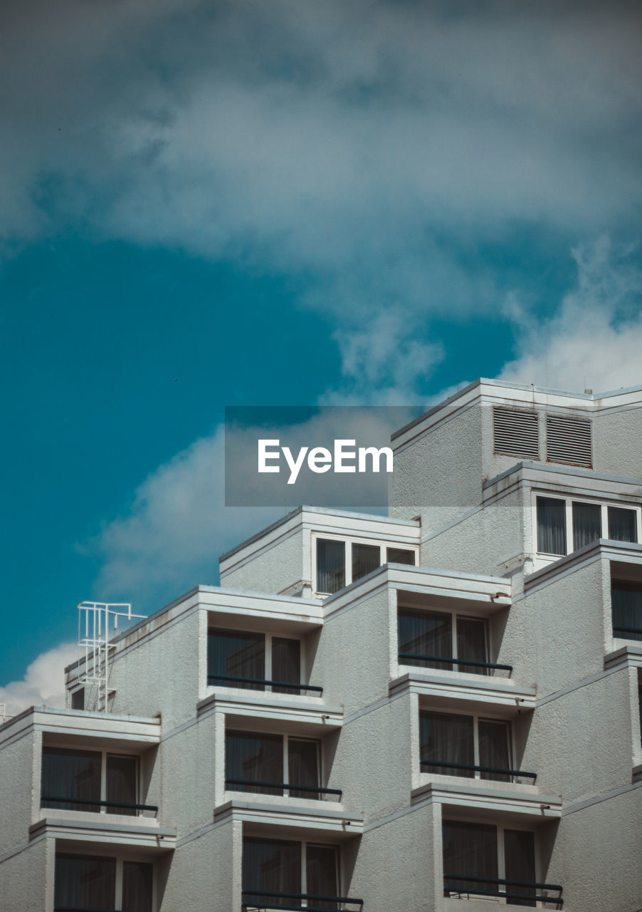 Low angle view of residential building against sky