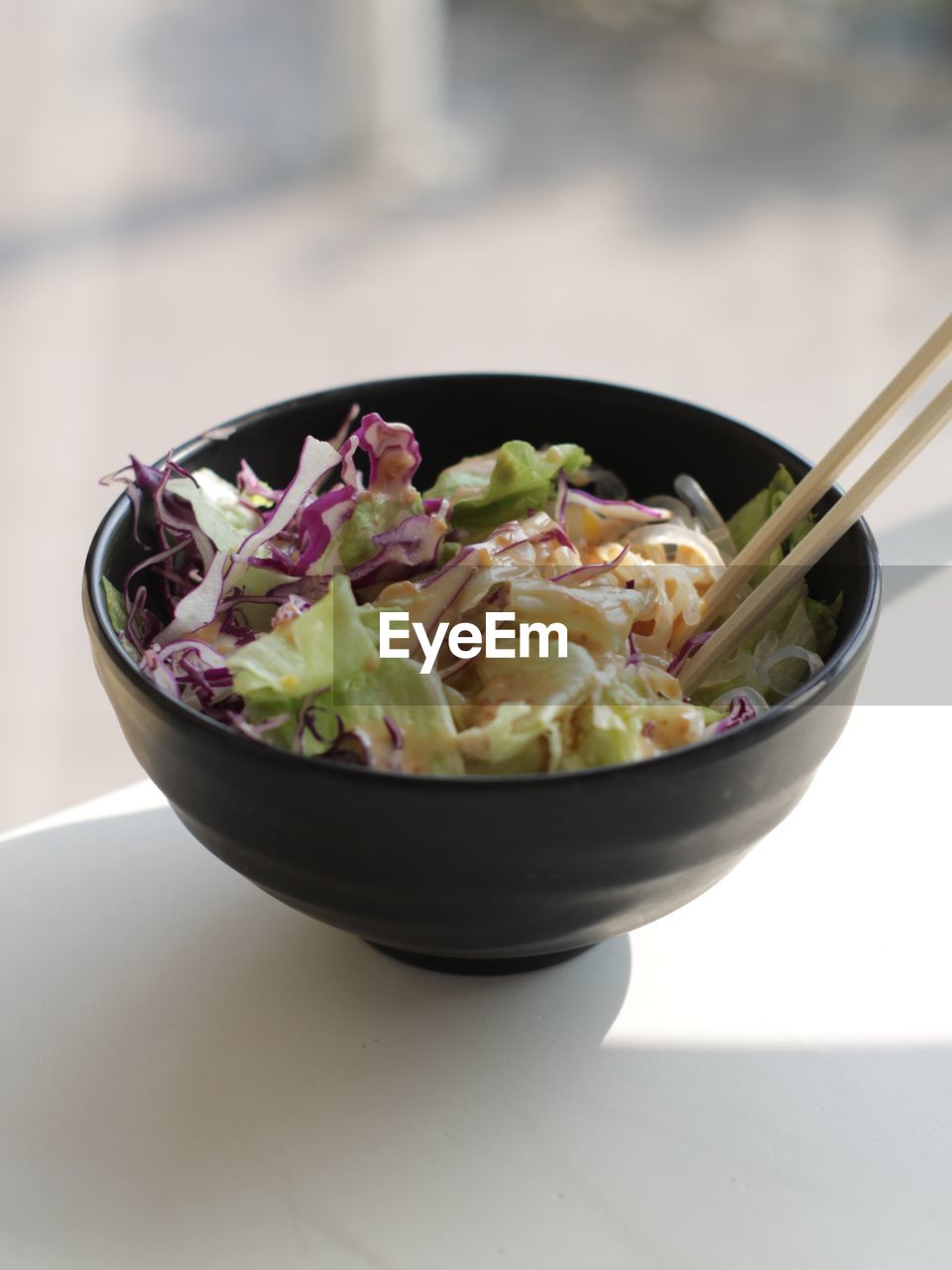Close-up of salad in bowl on table