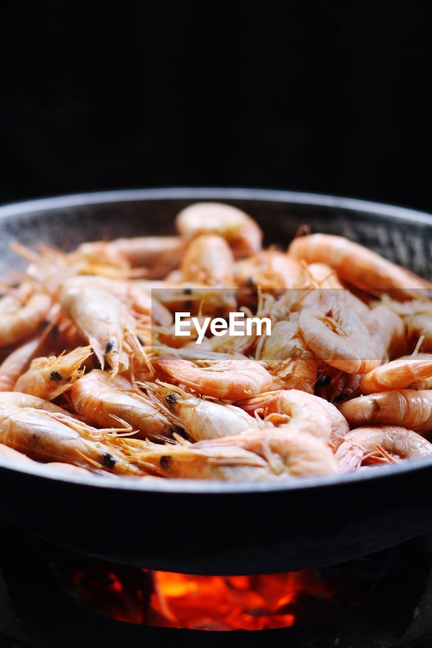 Shrimps being cooked in pan