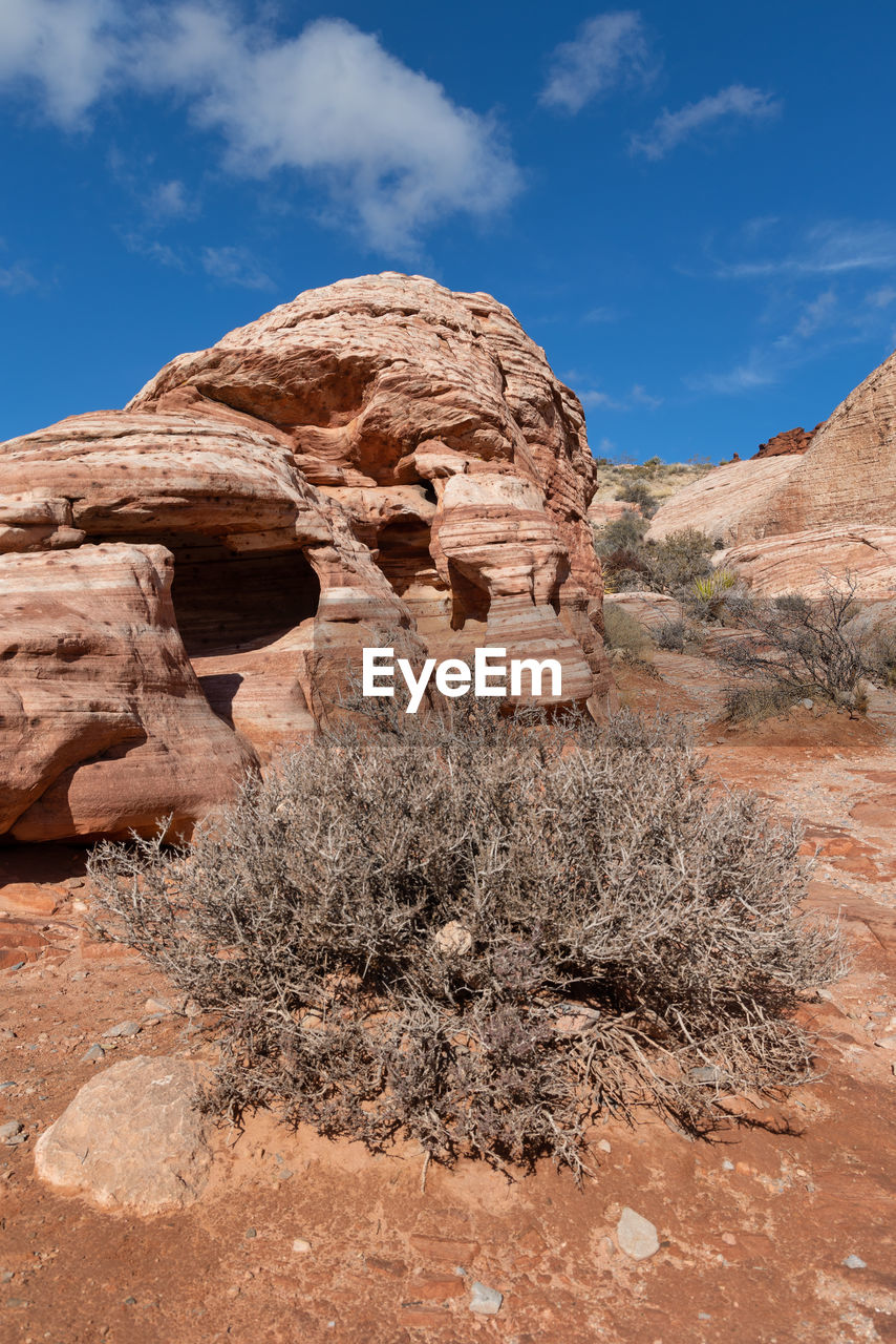 Rock formations on mountain against sky