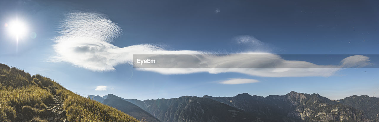 Panoramic view of mountains against sky