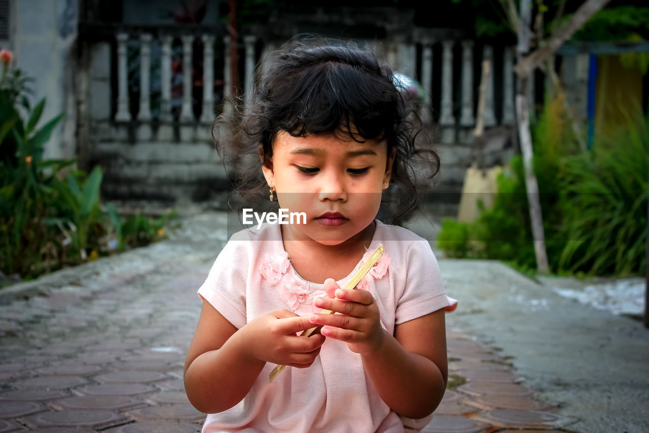 Portrait of cute girl in water