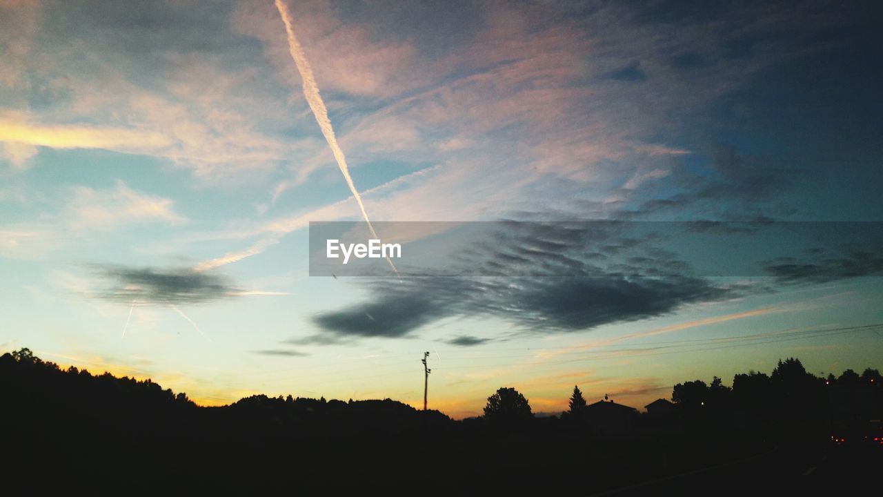 SILHOUETTE LANDSCAPE AGAINST SKY