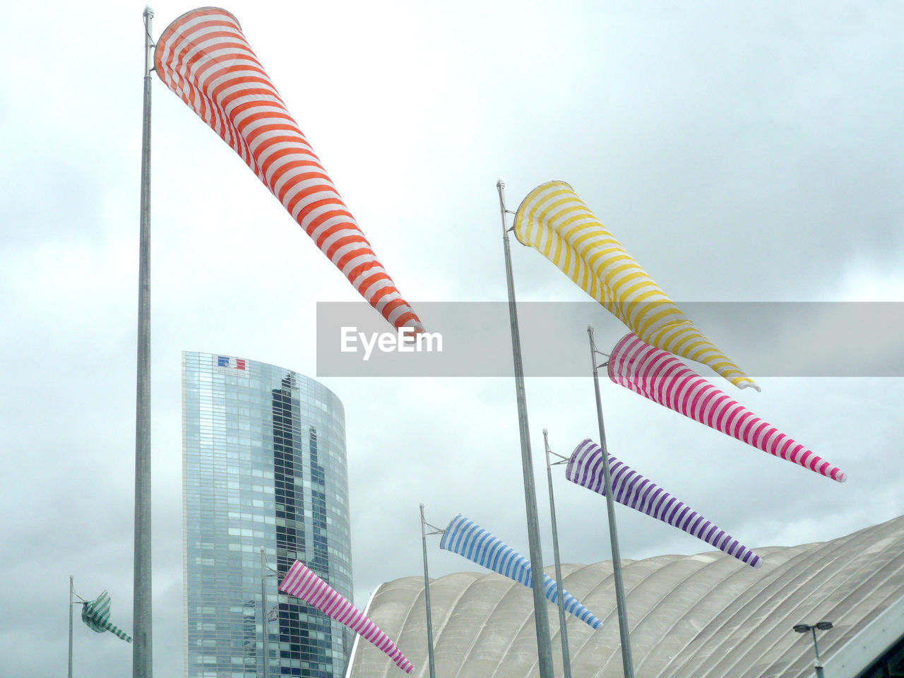 Low angle view of modern buildings against sky