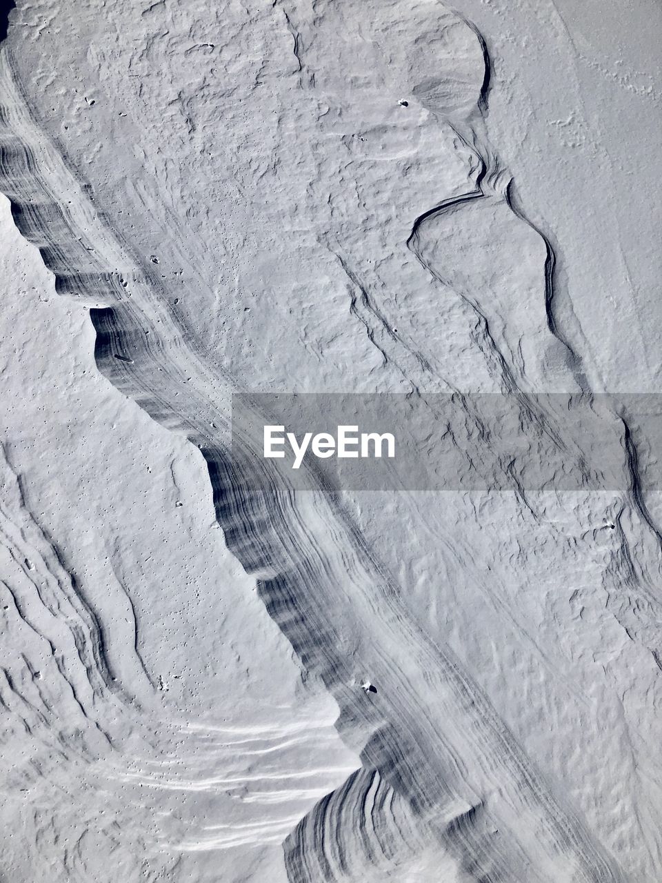 Wind manifestation in snow. switzerland