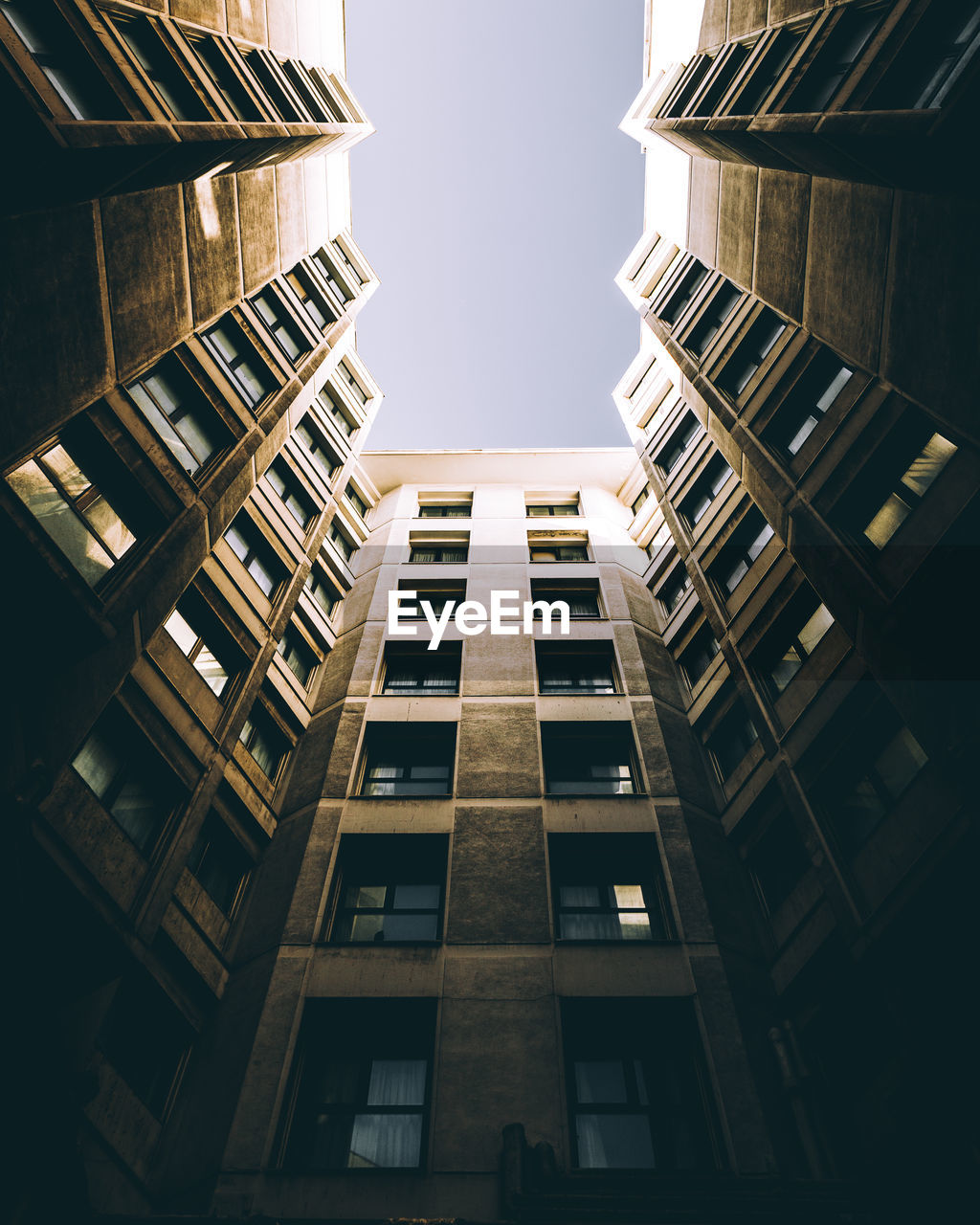 Low angle view of buildings against clear sky