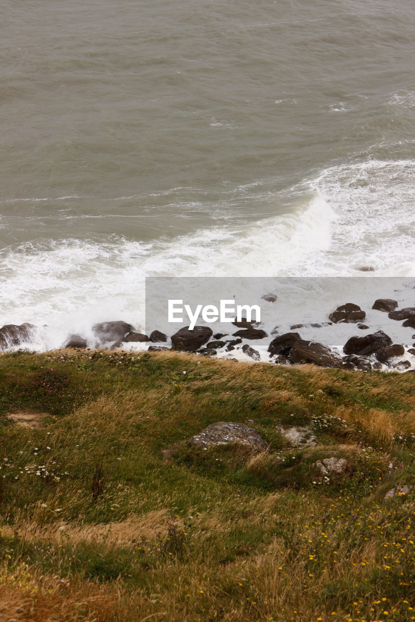 SCENIC VIEW OF LANDSCAPE AND SEA