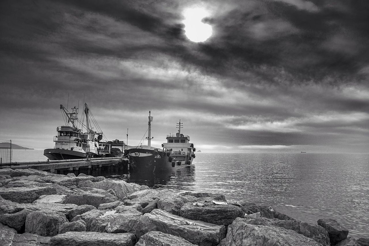 Fishing boat moored at harbor