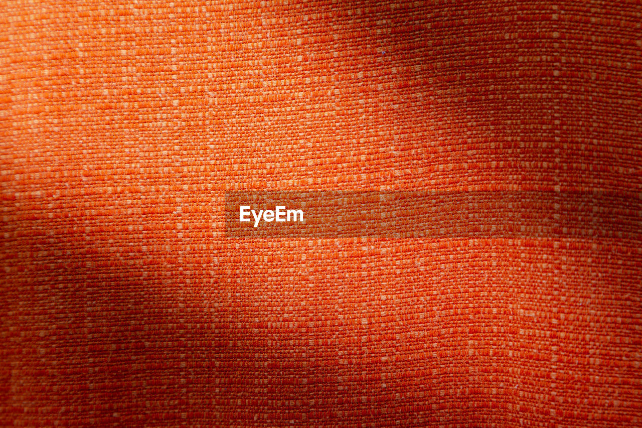 FULL FRAME SHOT OF RED AND ORANGE FABRIC