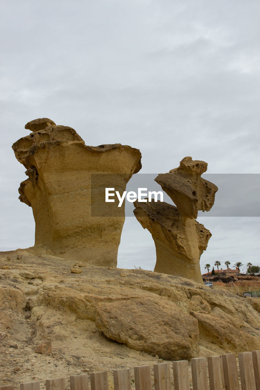 sand, ancient history, monument, rock, sculpture, temple, travel destinations, history, nature, sky, the past, travel, architecture, no people, cloud, ancient, rock formation, arch, monolith, land, outdoors, day, non-urban scene, art, scenics - nature, landscape, geology, environment, tourism, beauty in nature, desert, animal, formation, statue, representation, wood, ruins, animal themes