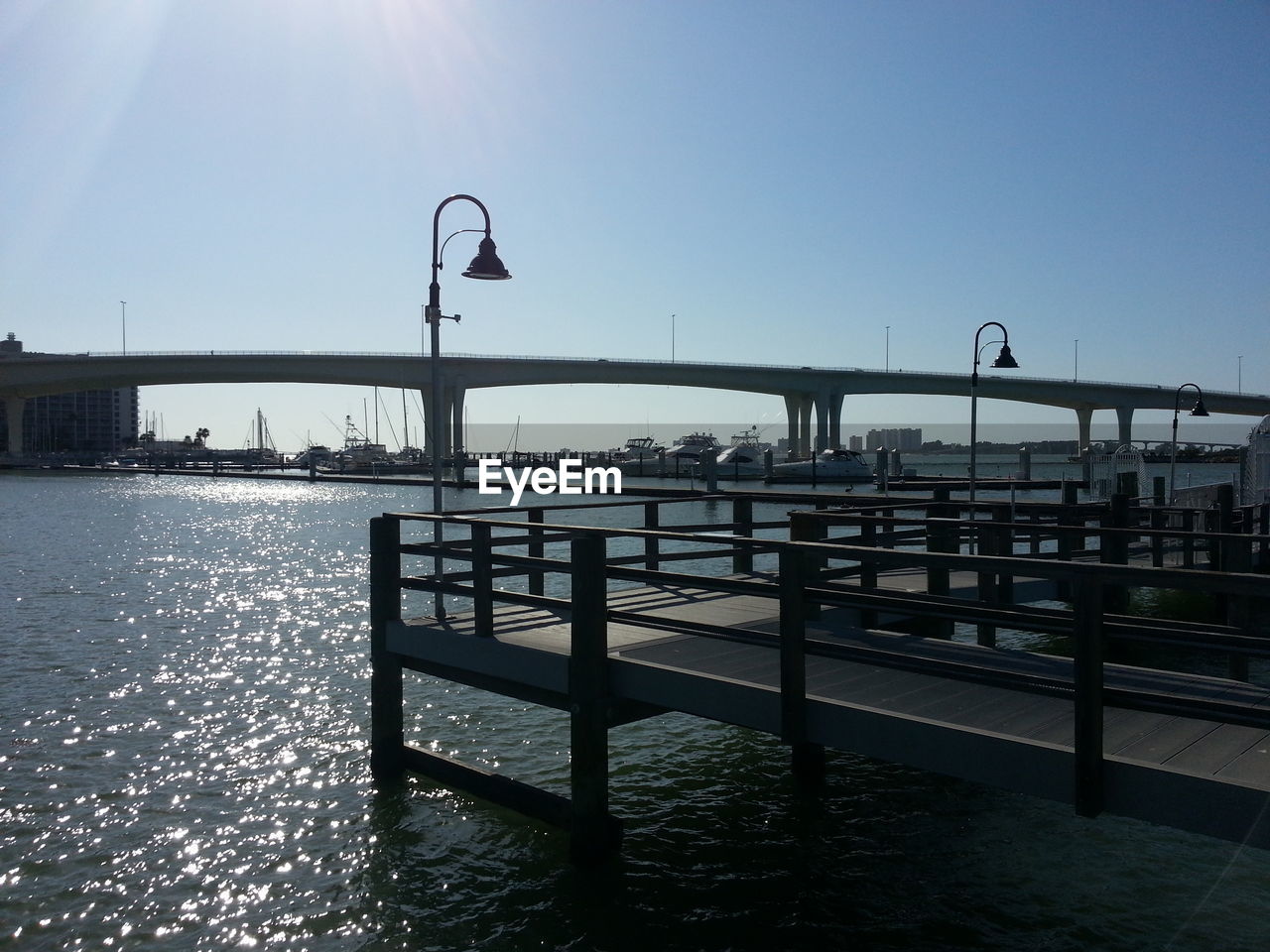 Jetty and bridge on background