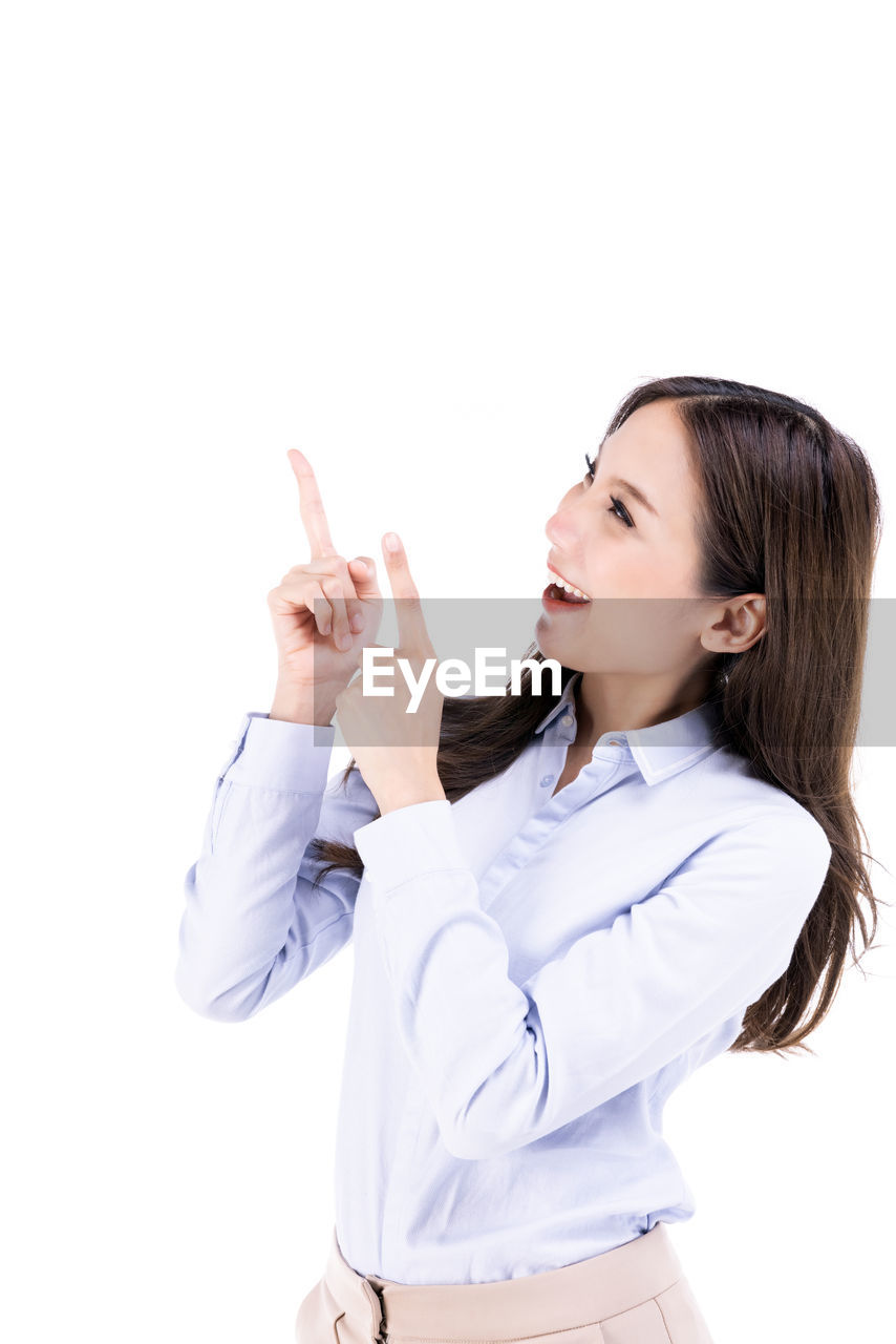 YOUNG WOMAN LOOKING AT CAMERA