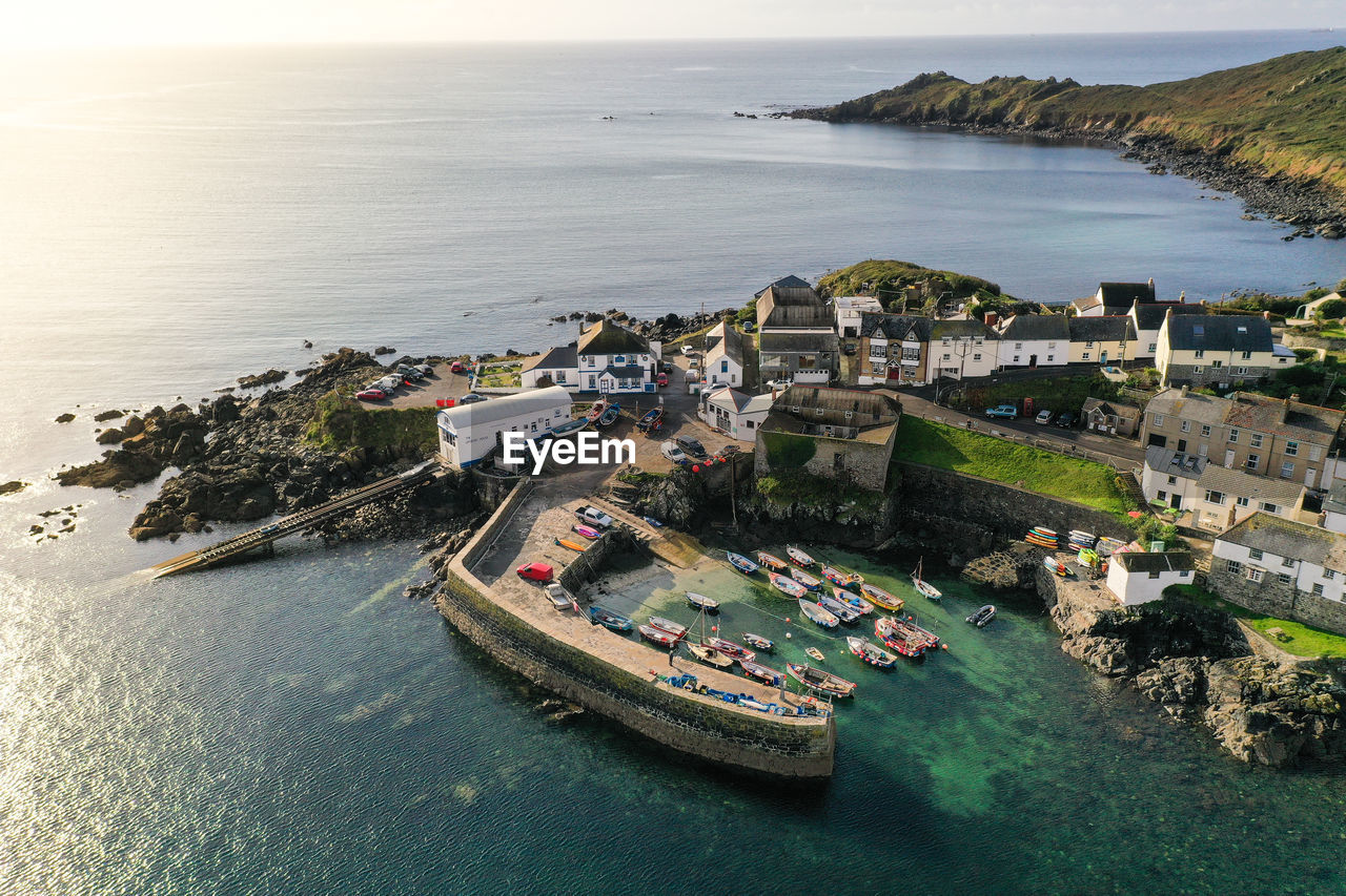 An aerial view of the cornish fishing village of coverack and harbour