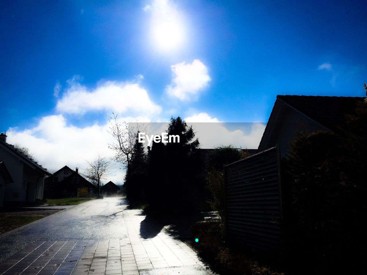 VIEW OF BUILDINGS AGAINST BLUE SKY