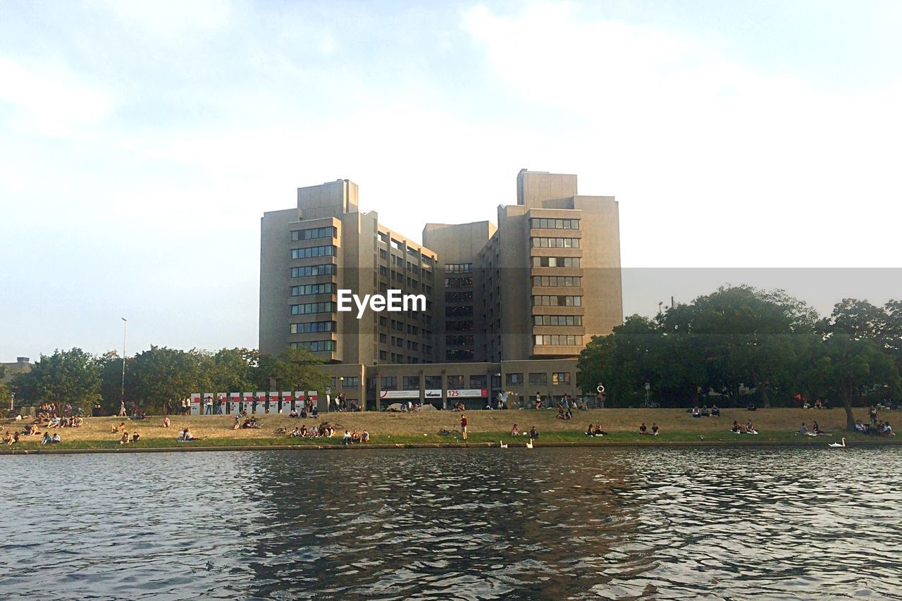 RIVER WITH BUILDINGS IN BACKGROUND