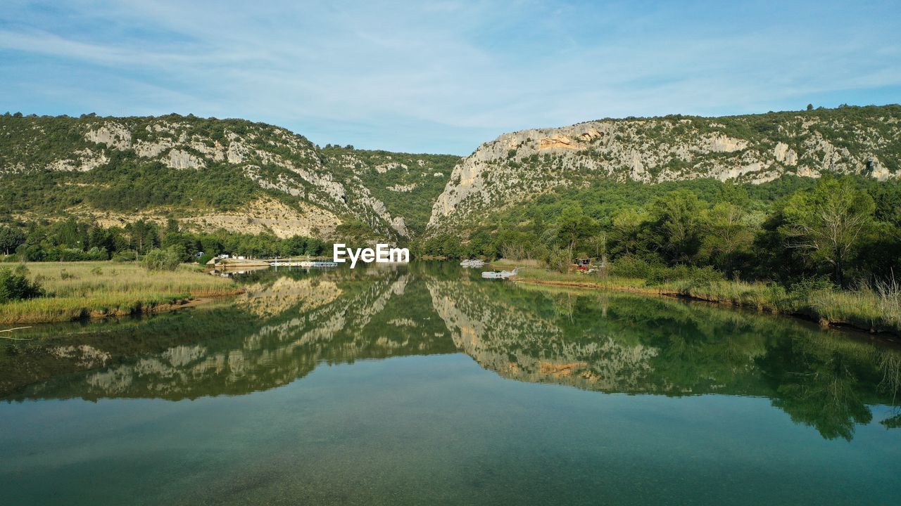 Scenic view of lake against sky