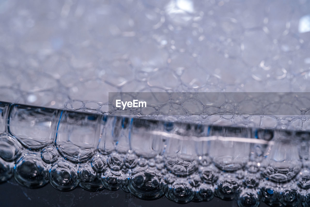 Close-up of bubbles in glass