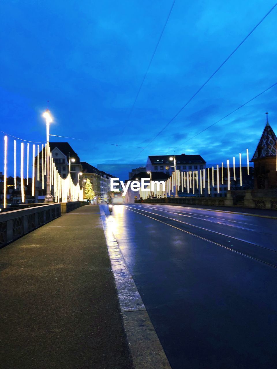 ILLUMINATED STREET AT DUSK