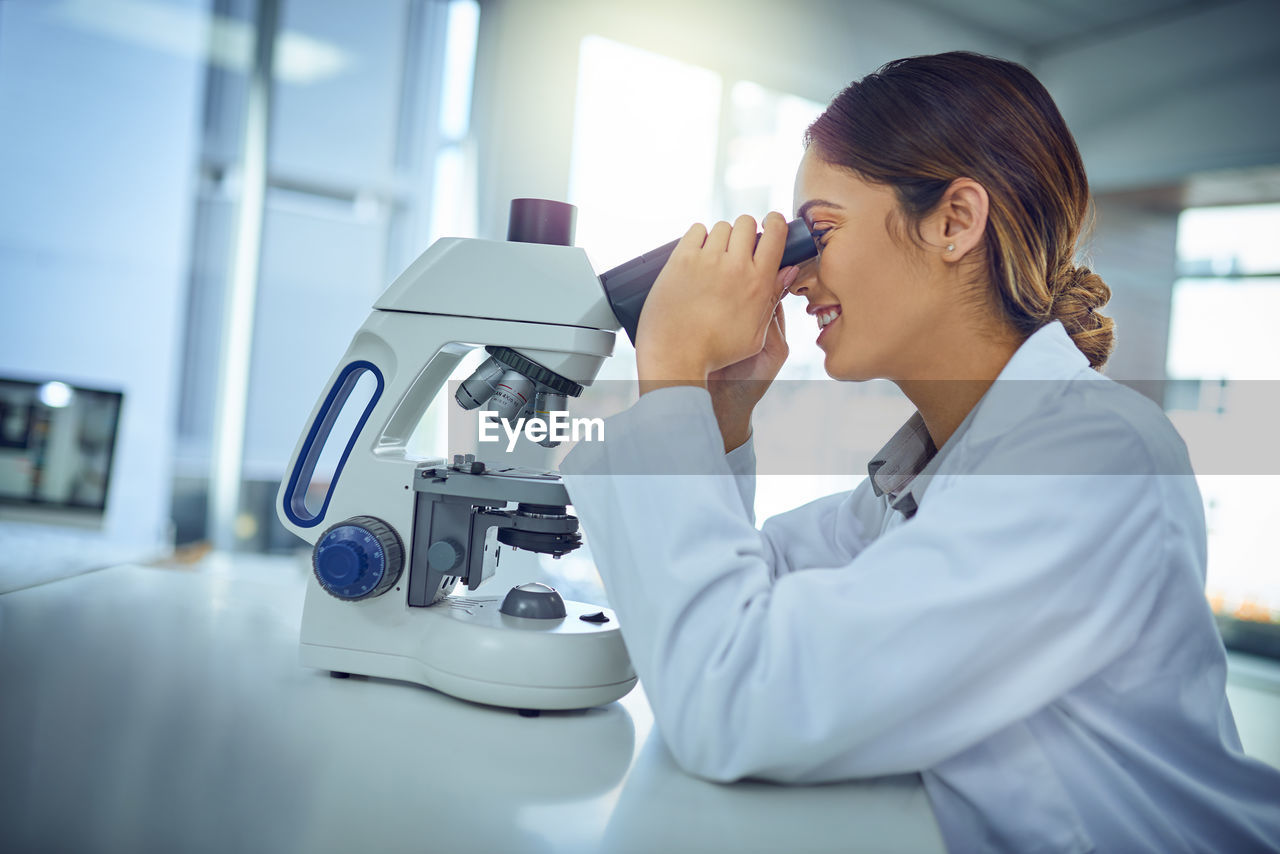 Female scientist doing research at lab