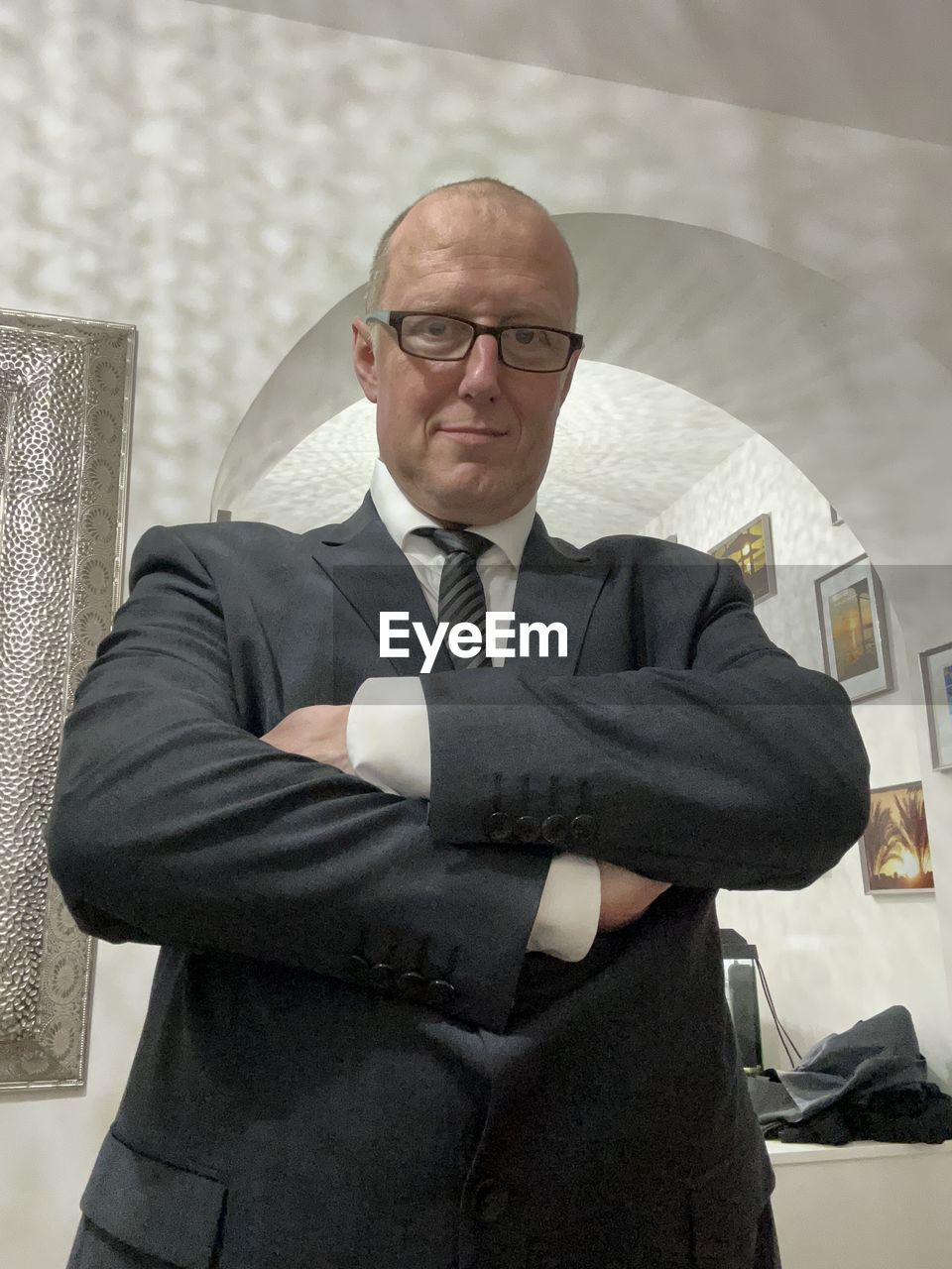 business, men, businessman, adult, one person, corporate business, business finance and industry, indoors, formal wear, person, relaxation, clothing, furniture, overworked, finance, mature adult, sitting, occupation, lying down, emotional stress, glasses, human face, eyeglasses, emotion