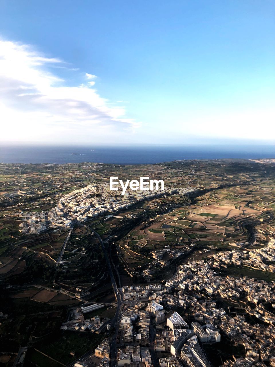 HIGH ANGLE VIEW OF CITY BUILDINGS AGAINST SKY