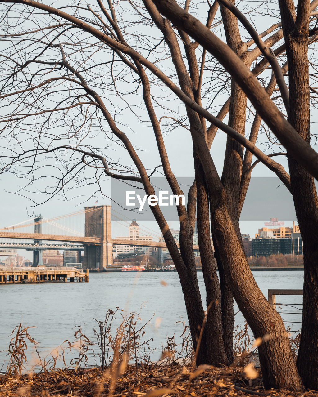 View of bridge over river in city