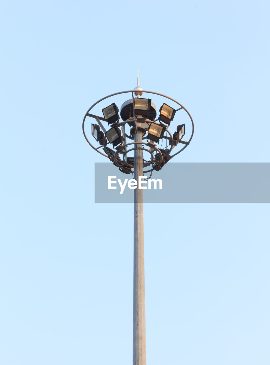 Low angle view of floodlight against clear sky