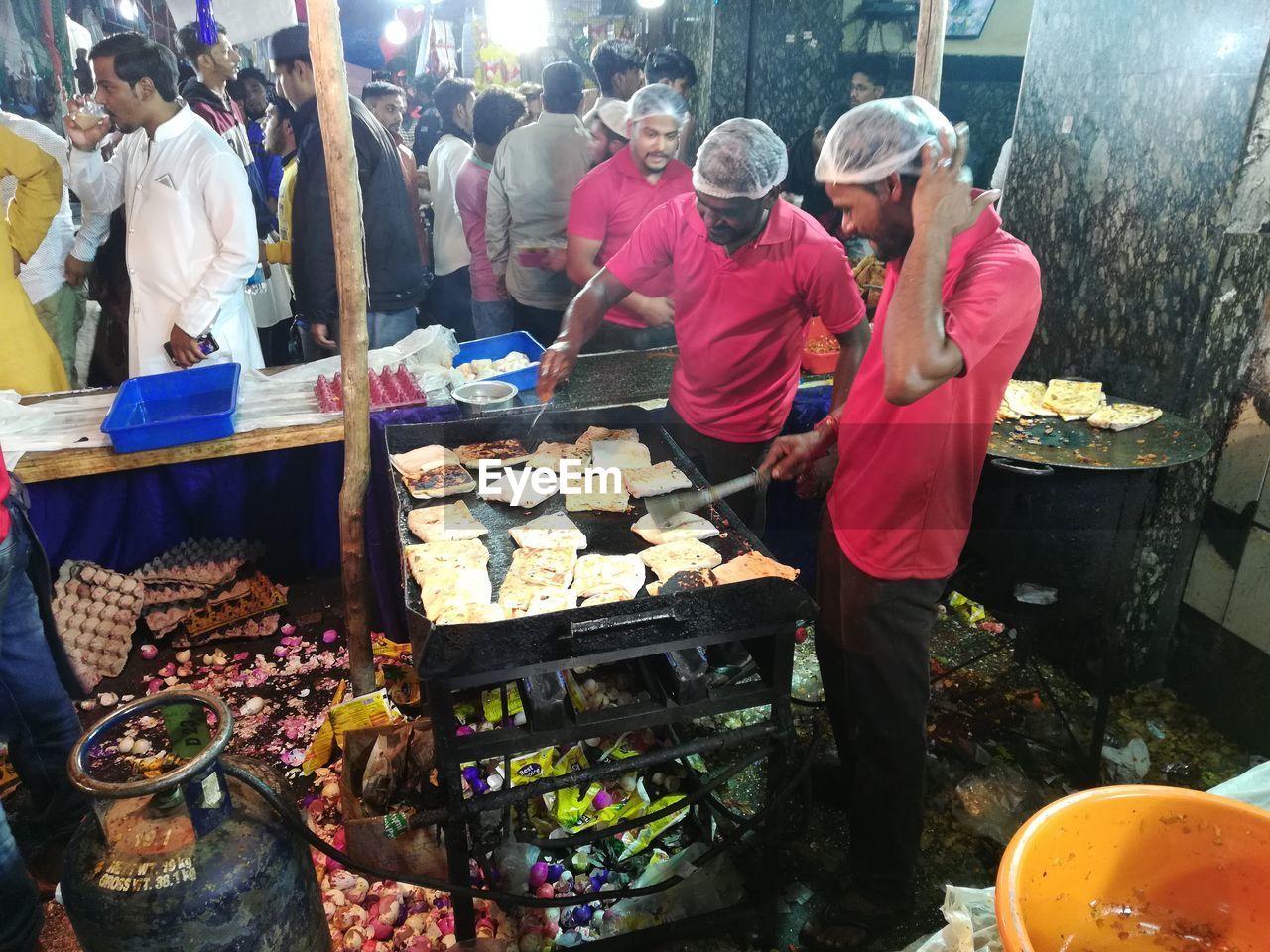 GROUP OF PEOPLE AT MARKET