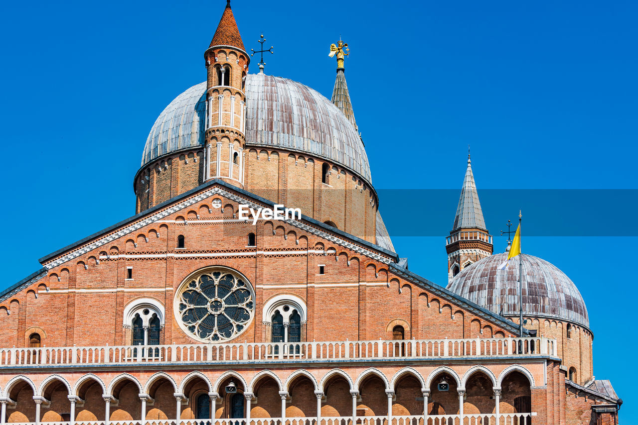 Low angle view of cathedral against clear blue sky