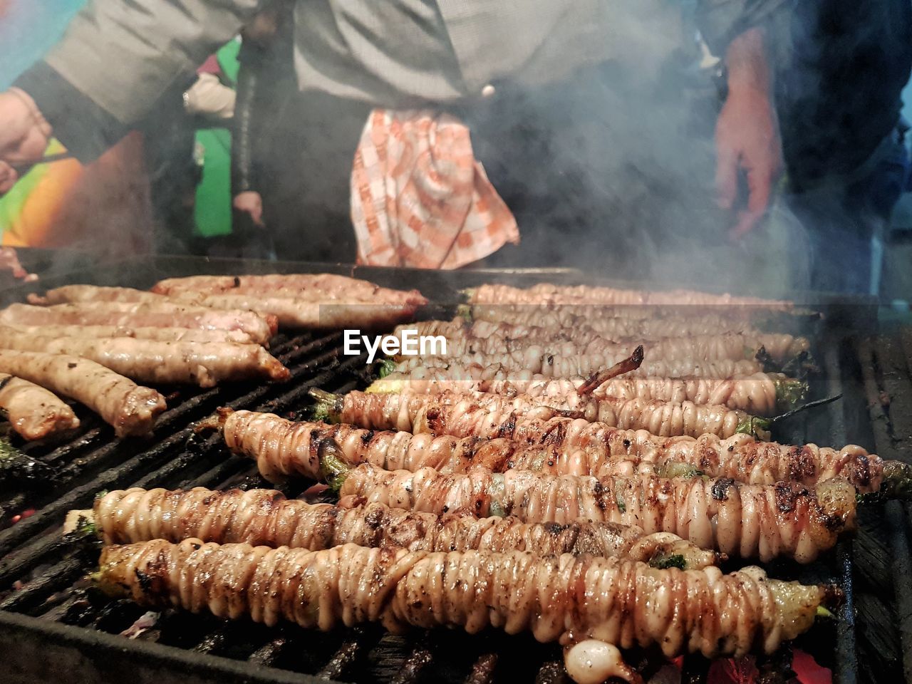 Close-up of meat on barbecue grill