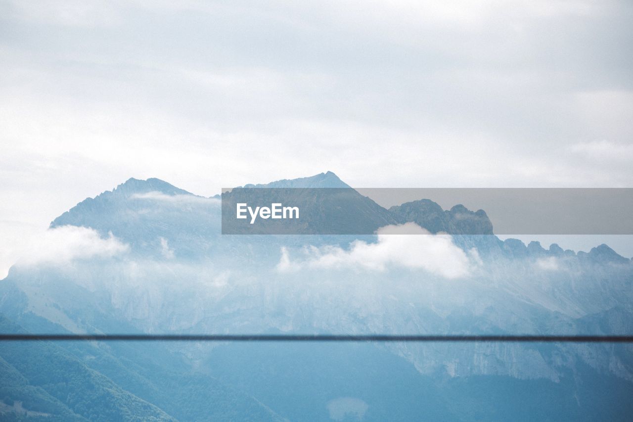 SCENIC VIEW OF MOUNTAIN AGAINST SKY