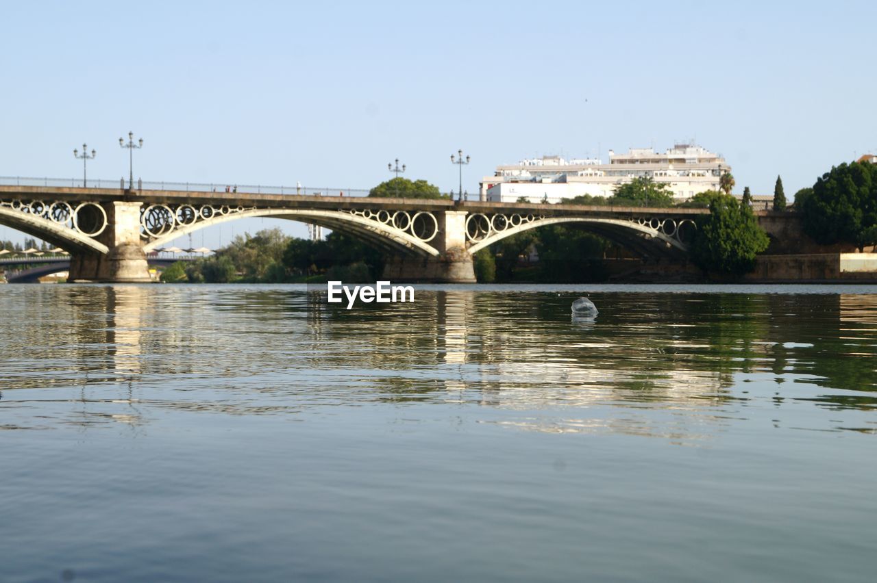 BRIDGE OVER RIVER WITH BRIDGE IN BACKGROUND