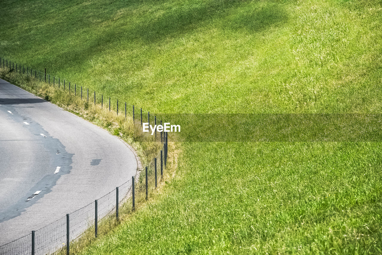 High angle view of road amidst field