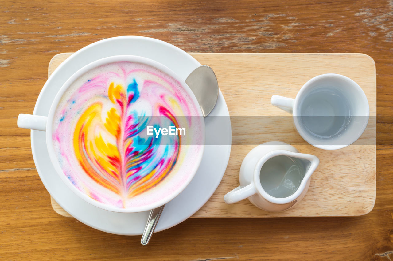 Multi colored cappuccino on table