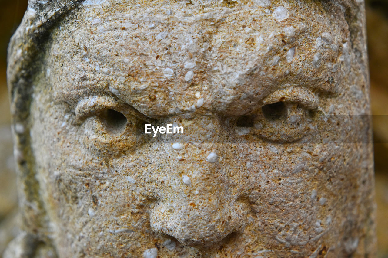 Detail shot of stone statue