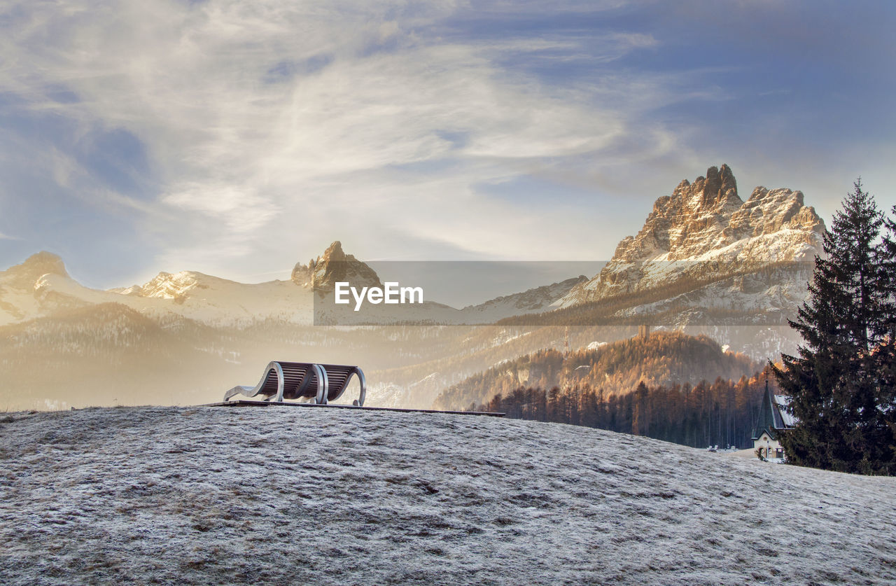 Scenic view of snowcapped mountains against sky